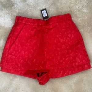 Maje
Jacquard trompe-lil shorts